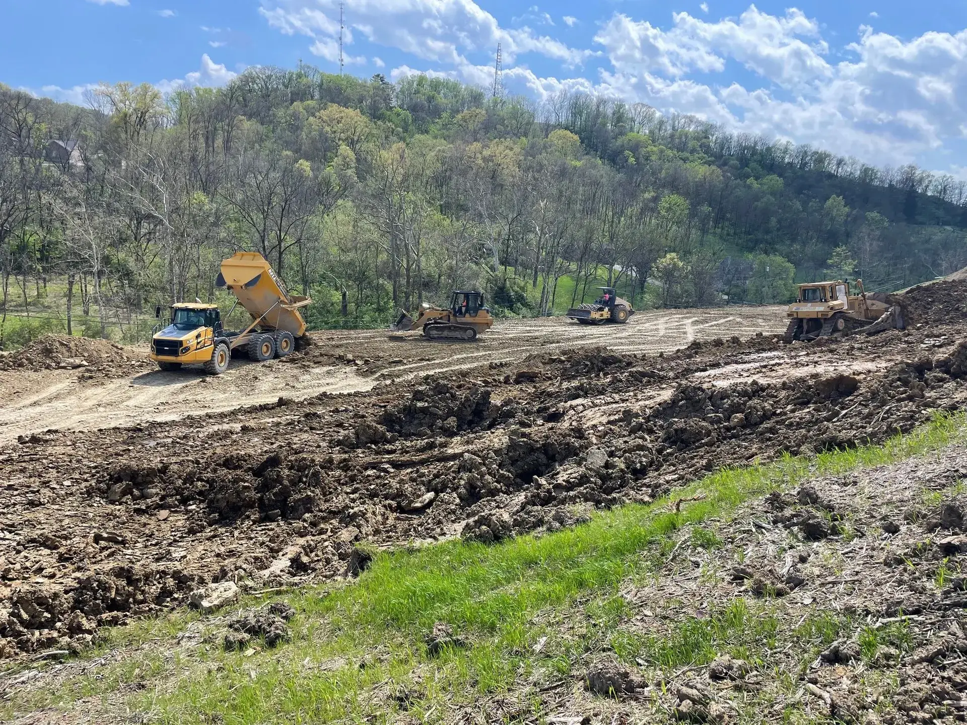 Pro Innovations excavation fleet cutting a hillside site